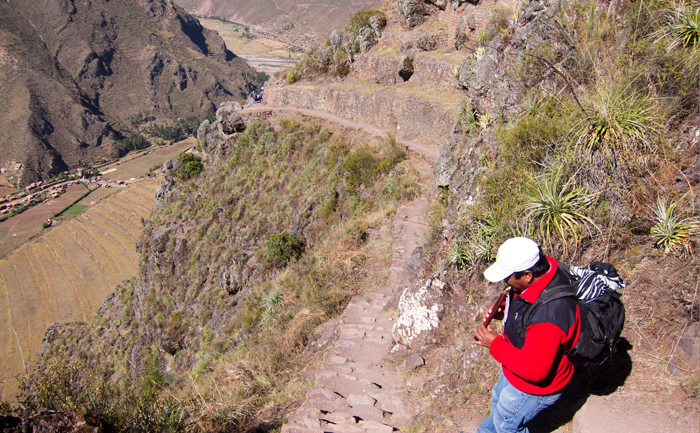 Sacred Valley Pisac Ruins guide playing the flute